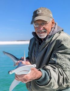 A person fishing at Panama City Beach