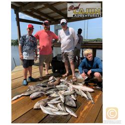 4 people fishing and hunting in LA