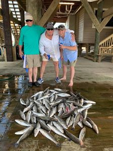 3 people enjoying a fishing and hunting trip in LA