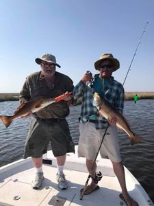 Two people fishing in LA