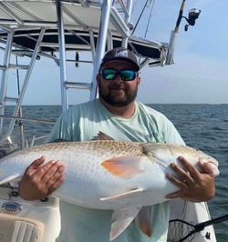 Captain Wayne showing off today's prize