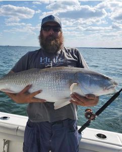 Captain Wayne celebrating a great day on the bay!