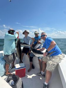 Fishermen with a cobia catch in Hampton