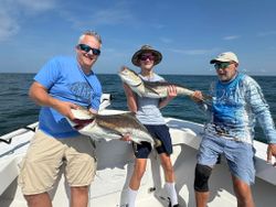Three people fishing in Hampton