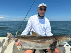 One fisherman with a big fish caught in Hampton
