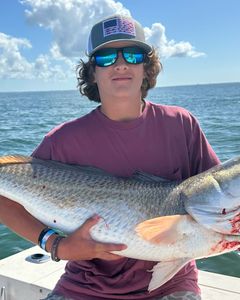 Fisherman with big fish caught in Hampton