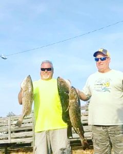 2 anglers fishing with rods in FL