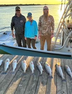 Group Fishing For Redfish In Texas