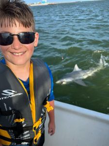 Angler with a 6-inch fish in Port O'Connor