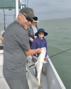Fishermen with a catch in Port O'Connor