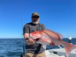 A fisherman with a big 27-inch catch at Port O'Connor