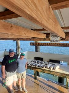Two anglers fishing in Port O'Connor
