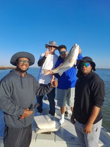 Four people fishing in Port O'Connor