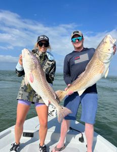 Two people fishing in TX