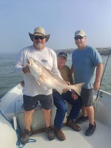 3 people fishing at Port O'Connor