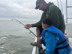 Angler with fishing rod at Port O'Connor