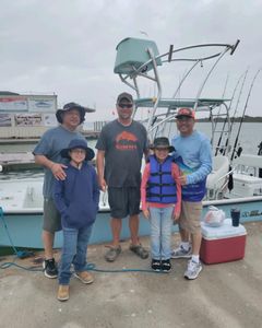 Group of 5 people fishing in Port O'Connor