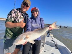 Two people fishing in Port O'Connor