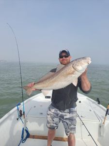 A person fishing in TX