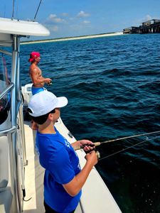 Anglers enjoying a day of fishing at Orange Beach