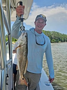 Redfish caught fishing in Orange Beach AL held up on boat
