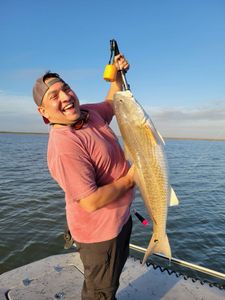 A person fishing in Matagorda