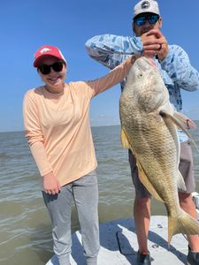 Angler with a big black drum fish in Matagorda