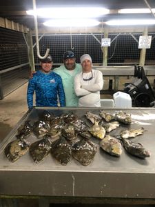 A group of 3 people fishing in Matagorda