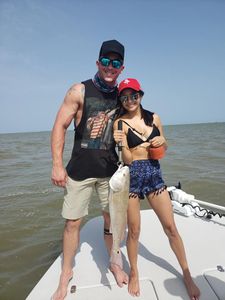 Two people fishing in Matagorda