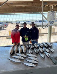 Three people fishing in TX
