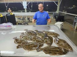 Two southern flounder, 126 inches long, caught in Matagorda, Texas