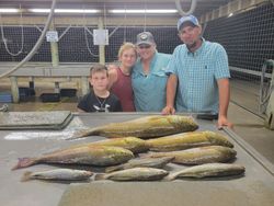 4 anglers posing with their catch in Matagorda, Texas