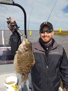 Fishing for a summer flounder in Matagorda