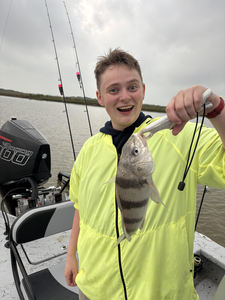 Reeling in a nice catch on the water!