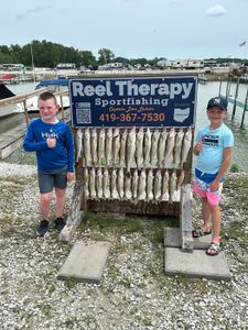 Fishing charter display board showing caught fish at Oregon OH marina