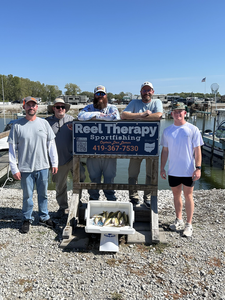 Great day on the water with jigging and trolling techniques in clear conditions!