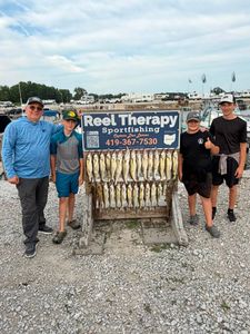 Successful fishing charter displaying fresh caught fish on cleaning station in Oregon OH