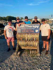 Successful fishing trip display with caught fish at Oregon OH marina
