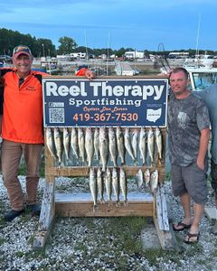 Three fishing rods with three caught fish in Oregon