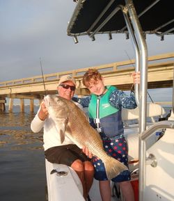 Two people fishing in Apalachicola