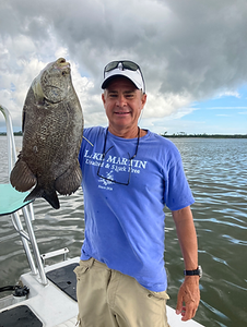 A person fishing in Apalachicola