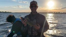 Smiling person fishing in Ontario