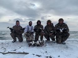 Group of 5 people enjoying fishing and hunting in Ontario