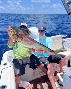 Anglers fishing in Islamorada, Florida with a 31-inch catch
