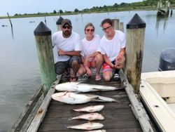 Anglers fishing in Virginia with 1 small fish