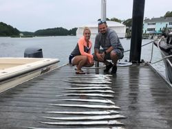 Two people enjoying a fishing trip in VA