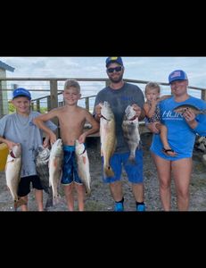 6 fishing rods with a view of Port Orange