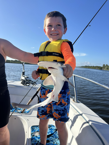 Reeling in a Bonnethead beauty on a clear day with storms brewing!