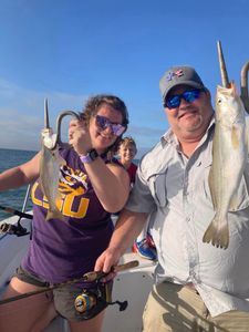 4 people fishing with 2 big fish in Port Orange