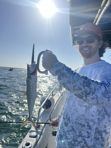 Enjoying a day of peaceful fishing on the open sea.